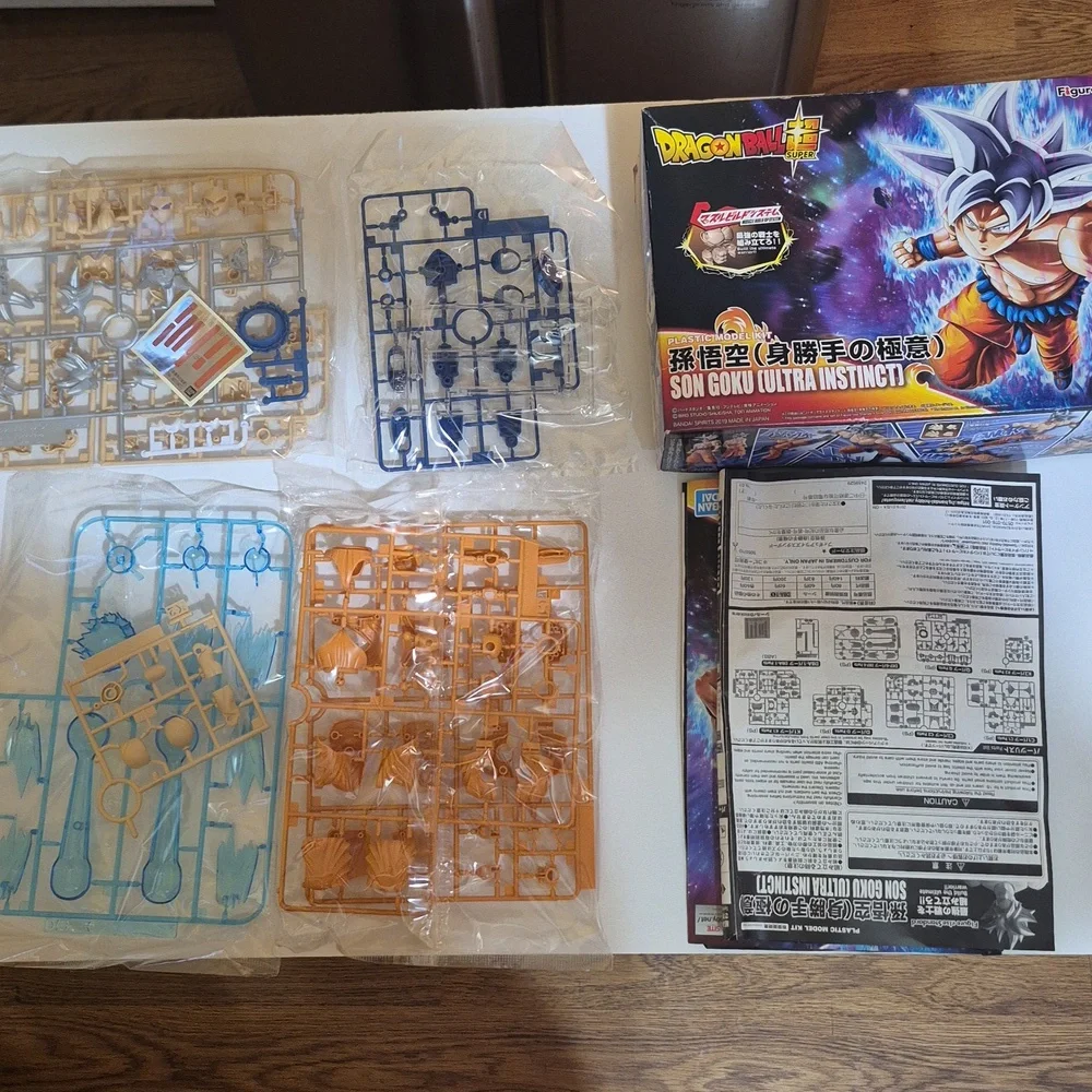 Dragon Ball Super Son Goku Ultra Instinct Figure New ALL BAGS SEALED.